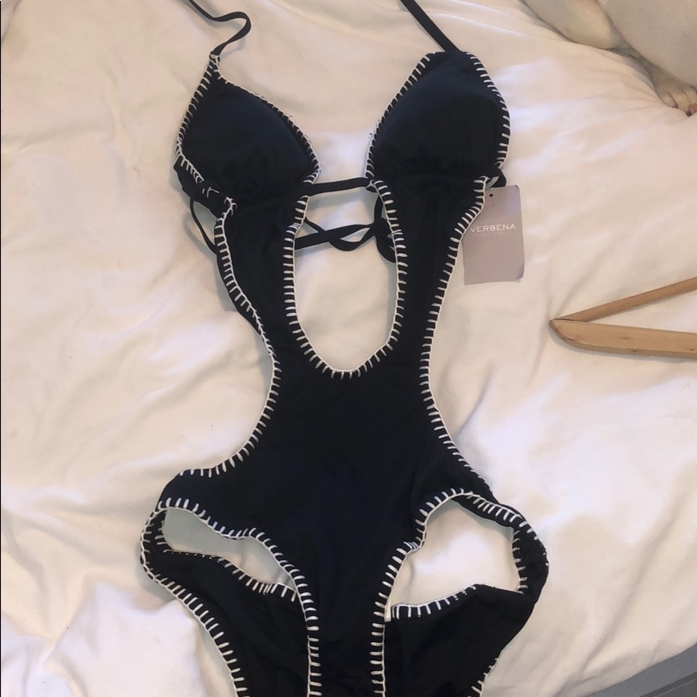 One piece bathing suit with cut outs
